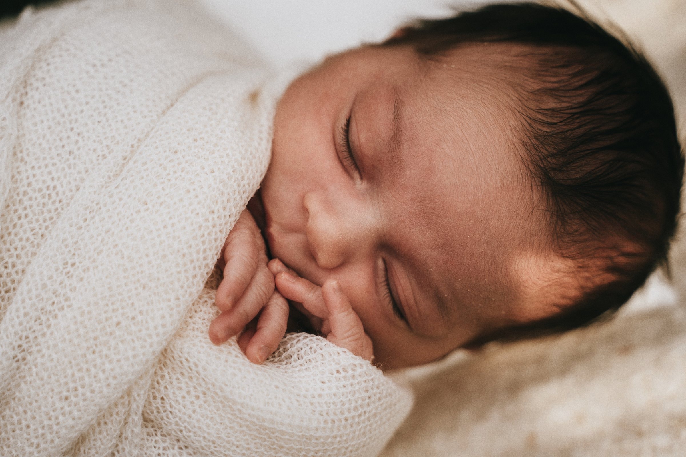 A close portrait of Amaya sleeping peacefully