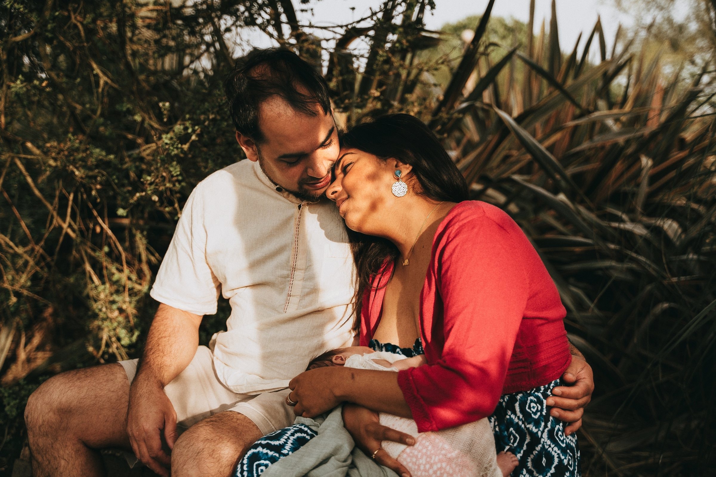 Amaya’s parents embracing as she feeds