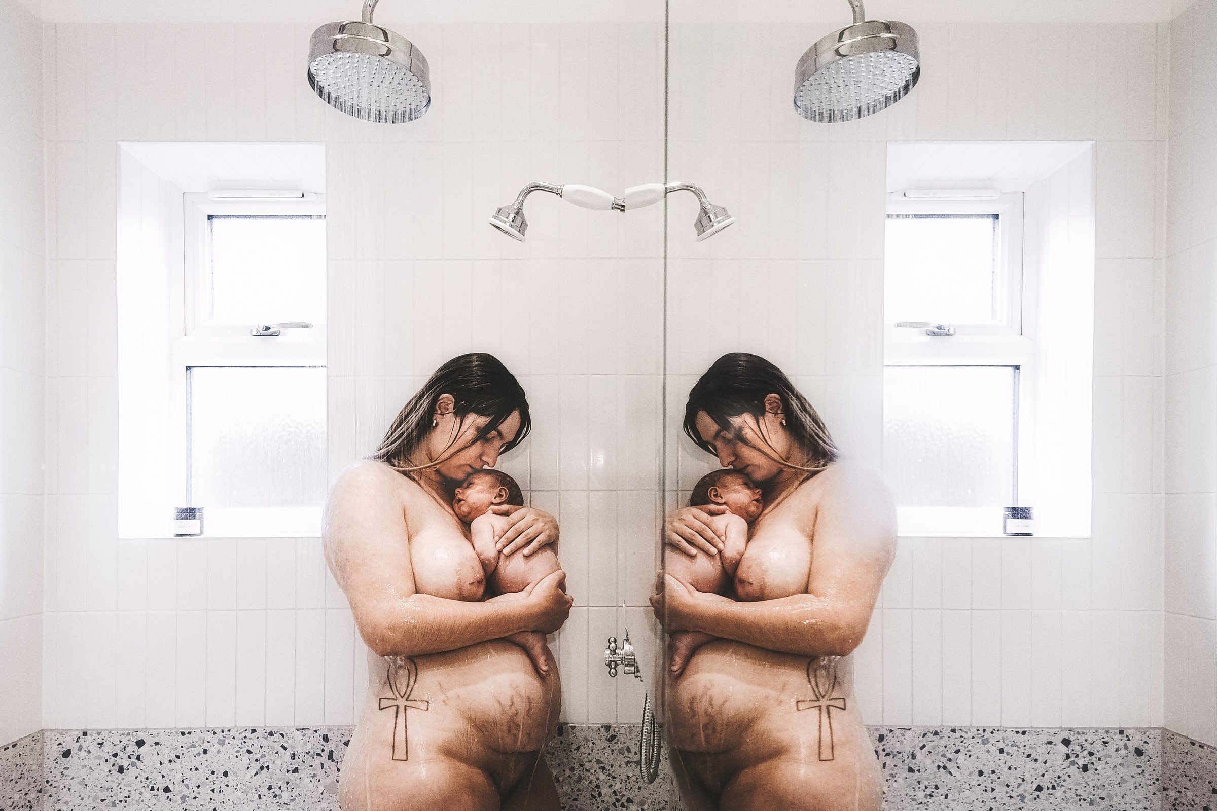Solene breastfeeding Juno in a monochrome double portrait