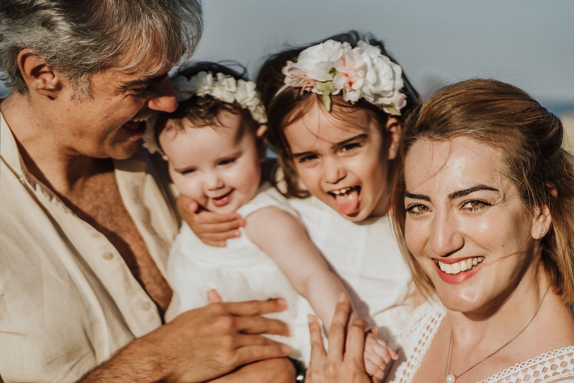 The family huddled in an affectionate close portrait